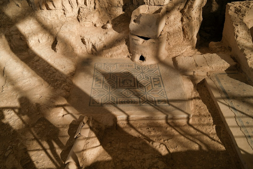 ancient stone ruins at sunset
